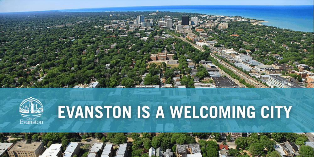 Aerial view of Evanston with words that say "Evanston is a Welcoming City"